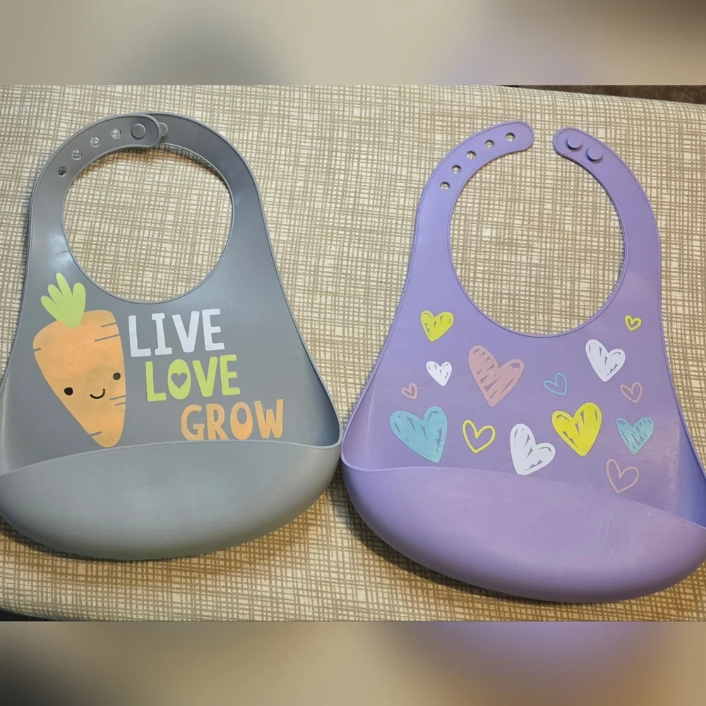 Children's bibs Two with pocket to catch the food. Purple and gray